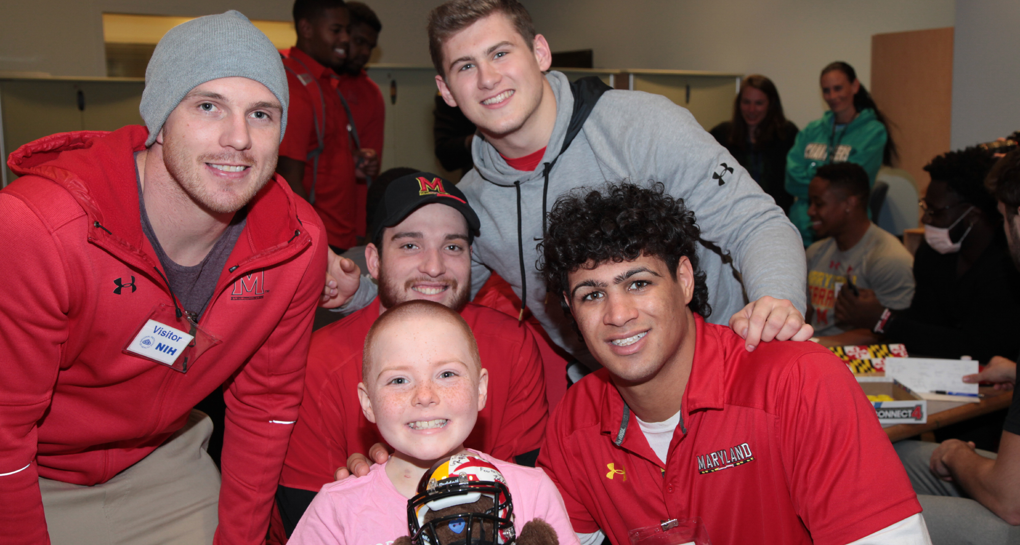 Football players from the University of Maryland visited patients Feb. 27, 2017, during Rare Disease Day at NIH to inspire those battling uncommon illnesses. 