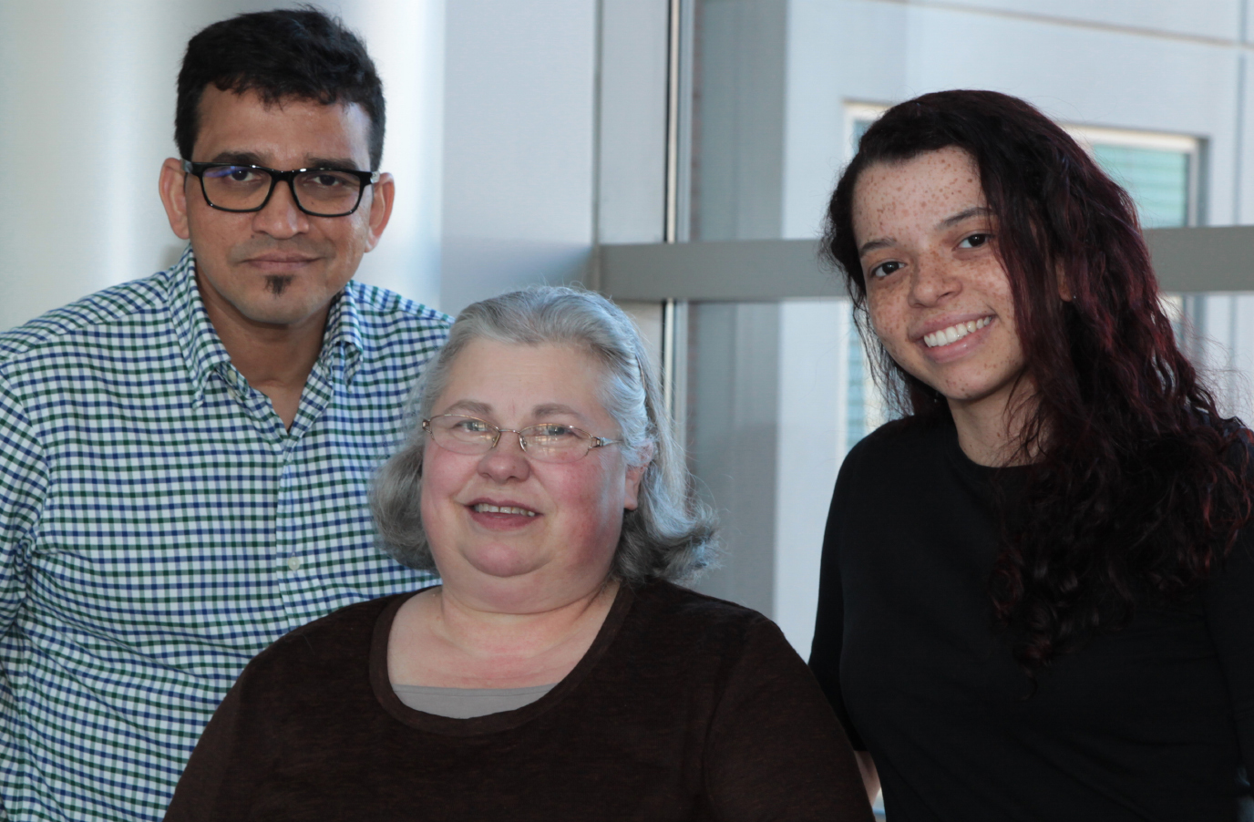 Yogesh Kalotra (left), Deborah Crawford (center) and Natalia Sampaio Moura