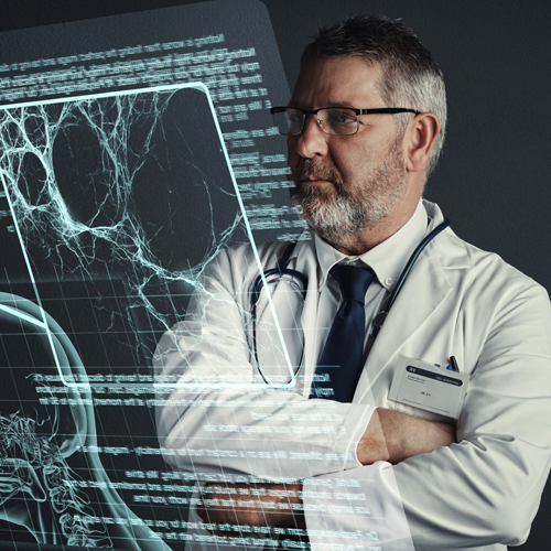 researcher studying a medical scan