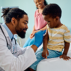 doctor examining child