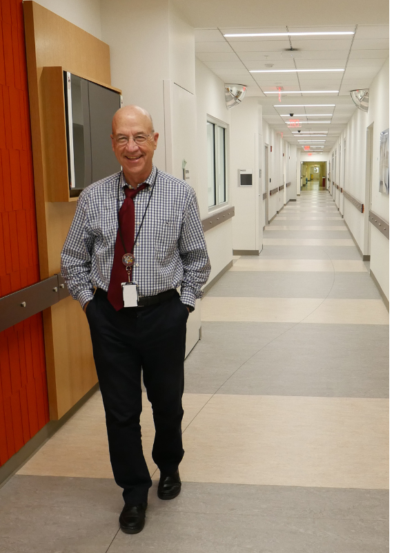 Dr. Gilman Walking in CC E-Wing 