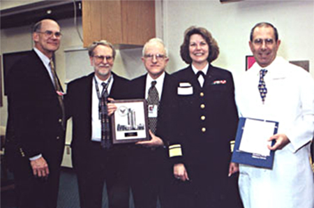 Dr. Thomas Fleisher, chief, Laboratory of Medicine, Dr. Steven Fischer, Dr. Frank G. Witebsky, Rear Adm. Kathleen Martin and CC Director Dr. John Gallin