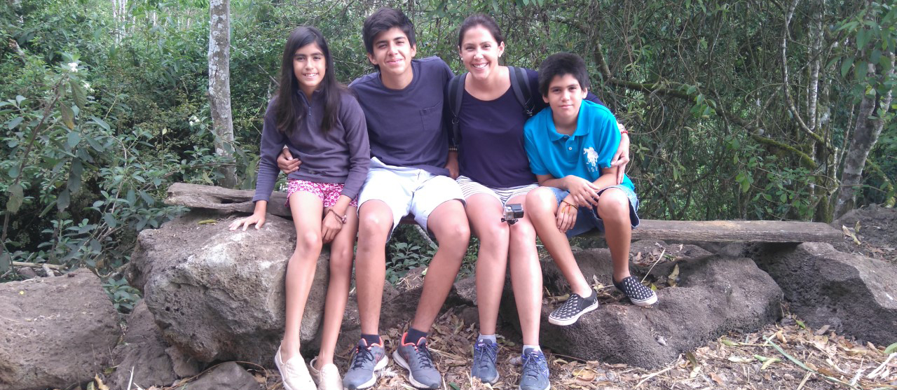 After battling acute myeloid leukemia at the NIH Clinical Center, Nelly Vinueza (second from right) is now able to enjoy quality time with her kids.