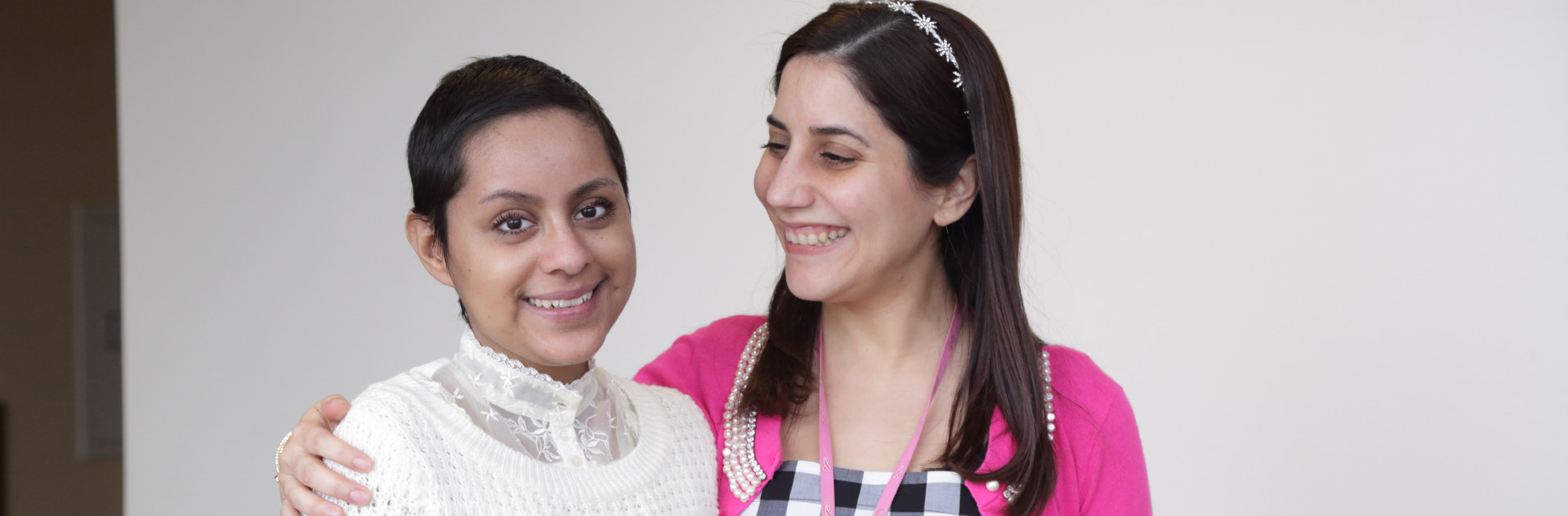 Clinical Center patient Llasmin Canseco (left) with one of her care providers, Celina Montemayor.