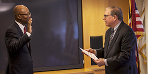 Pius Aiyelawo swearing into the Senior Executive Service with Dr. Lawrence Tabak