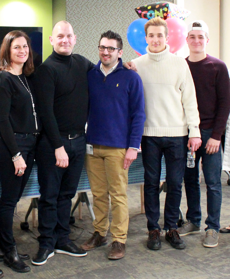 Jackson Taylor (fourth from left), meets his bone marrow donor, Sean McLaughlin (third), with his parents and brother