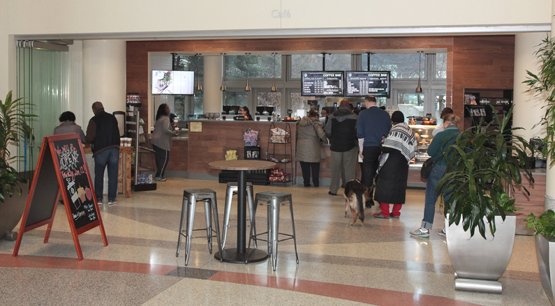 People line up at the new marketplace Starbucks café