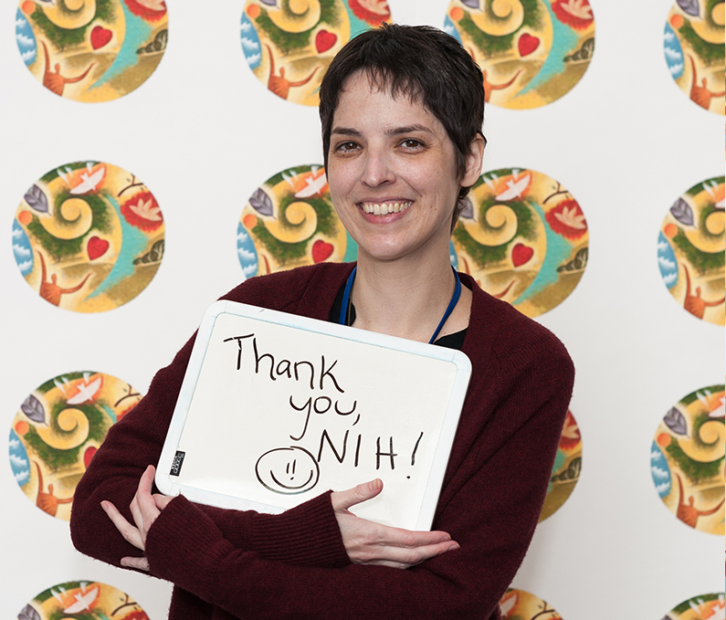 Patient with caregivers participate in 2017 Caregiver Day photo booth