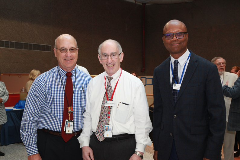 Jim Gilman, Harvey Klein and Pius Aiyelawo