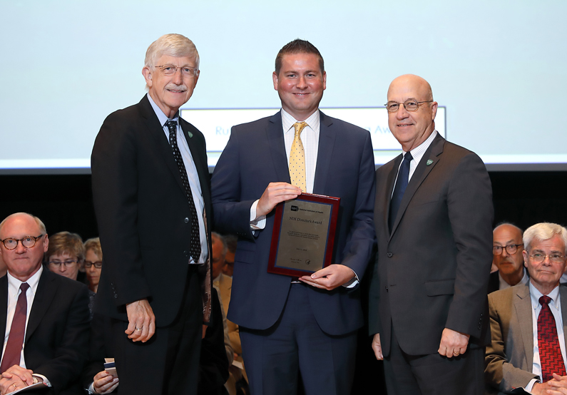 Dr. Francis Collins, Mentoring awardee Dan Lonnerdal and Dr. Jim Gilman.