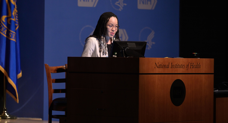 Kamille West at a podium