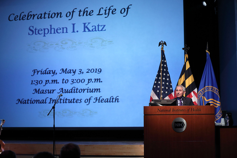 Dr. Anthony Fauci at a podium.