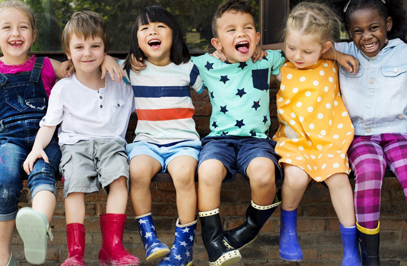 a group of children sitting together