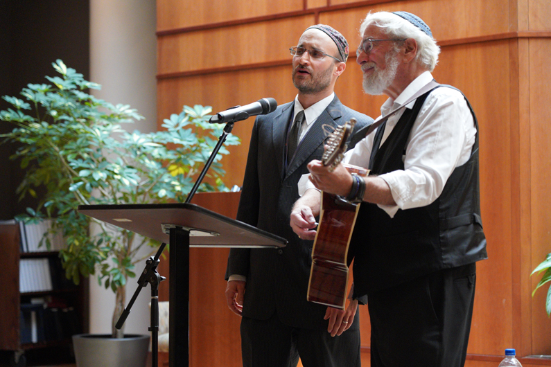 Rabbi David Shneyer (right) shared songs of healing from the Jewish tradition