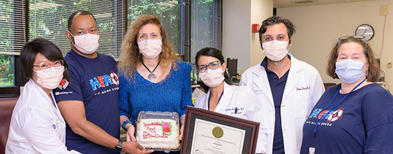 From left, Dr. Linda Song, Hal Wilkins, donor Dr. Carol Scott; Dr. Valentina Baez Sosa, Dr. David Daniel and Maura O'Rorke