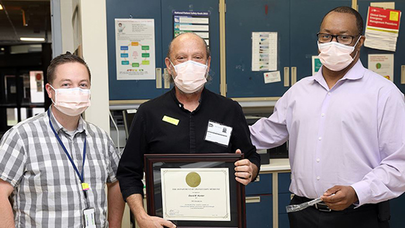 From left, Dr. James Long, donor David Hunter and Hal Wilkins