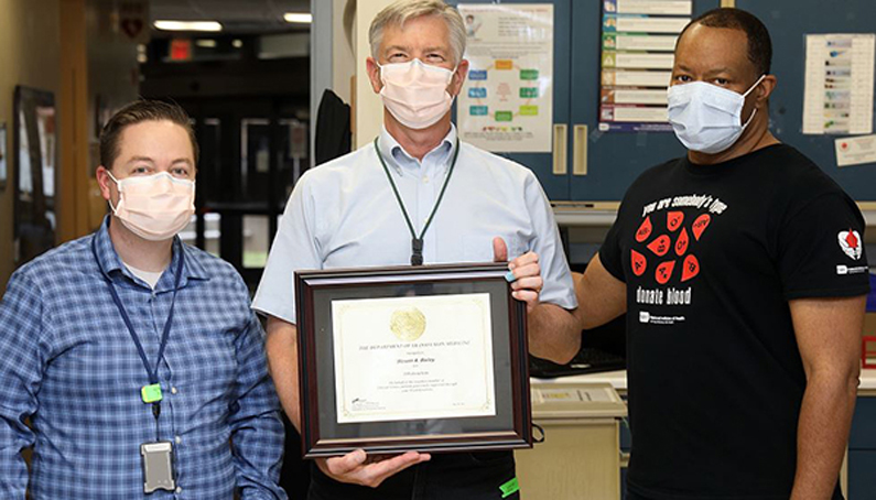 From left, Dr. James Long, Steven Bailey and Hal Wilkins