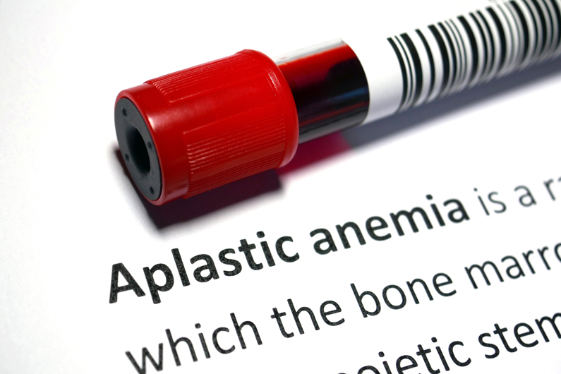 a vial containing blood sits above the words Aplastic anemia