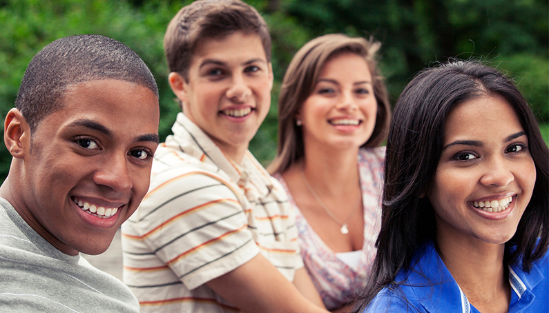 a group of people smiling