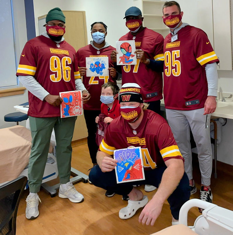 Pediatric patient meets NFL players