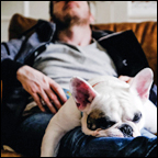 man and dog sleeping