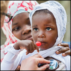 doctor listening to a child's heartbeat