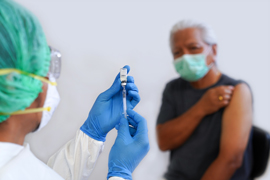 a patient receiving a vaccine