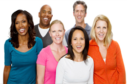 a group of people standing together smiling