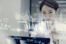 female doctor analyzing patient data at a computer