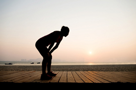 a woman resting from jogging