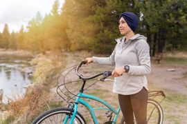 A woman riding a bike