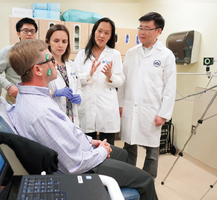 Researchers watch as patient moves mouth