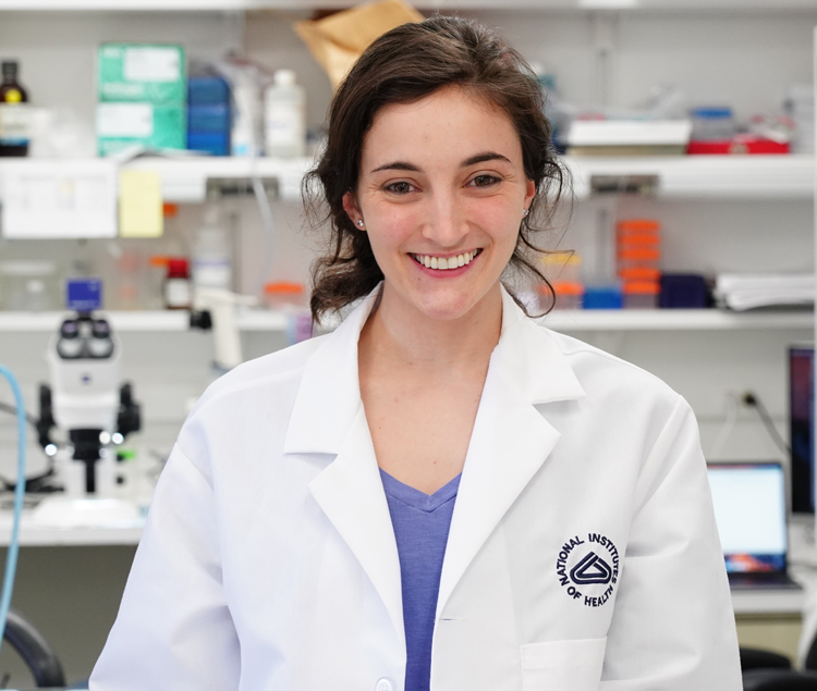 smiling woman in a lab