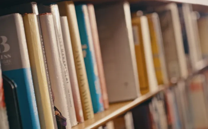 A row of bookshelves filled with books.