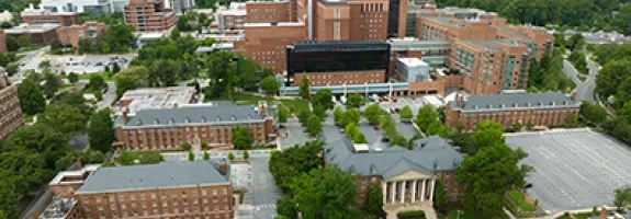 Photo of buildings on the NIH campus, including the East side of the NIH Clinical Center
