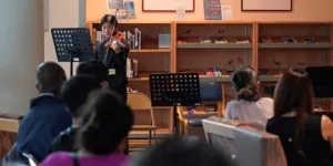 Student violinist performs in the NIH Patient Library for the new Tiny Twilight Concert Series