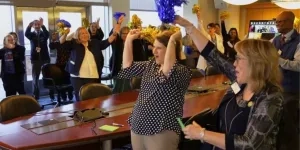 clinical center staff cheering at the Magnet announcement